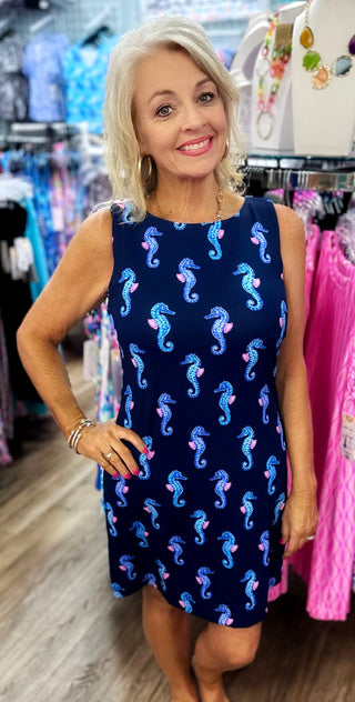 Stay stylish & sun-safe in this UPF50 scoop neck dress. Soft, stretchy, and perfect for travel or everyday wear. A best-seller you'll love all year!