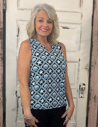 Stay cool, comfortable, and effortlessly stylish in this Lulu-B Sleeveless V-Neck Top. Made with lightweight, breathable SPX fabric, it offers all-day comfort with premium UPF50+ sun protection. The cooling, quick-drying material moves with you, making it perfect for everyday wear, travel, outdoor activities, or layering.