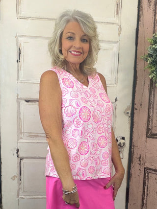 Stay cool, comfortable, and effortlessly stylish in this Lulu-B Sleeveless V-Neck Top. Made with lightweight, breathable SPX fabric, it offers all-day comfort with premium UPF50+ sun protection. The cooling, quick-drying material moves with you, making it perfect for everyday wear, travel, outdoor activities, or layering.