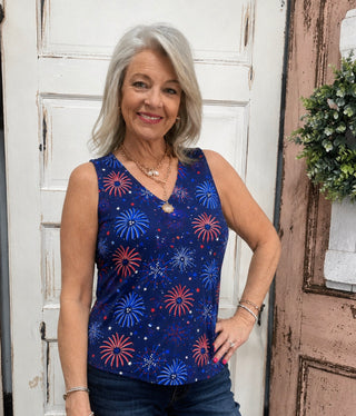 Stay cool and protected in the Lulu-B Sleeveless V-Neck Tank. Lightweight, breathable SPX fabric with UPF 50+ sun protection. Quick-drying and versatile.
