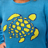 Stay cozy and stylish in this crewneck sweater crafted from a soft 55% acrylic and 45% cotton blend. Features a classic fit and a 25.5" center back length. Easy care — just machine wash cold and line dry.