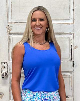 Sleek, simple, and effortlessly stylish! This sleeveless tank is made from a soft, stretchy 92% Nylon / 8% Spandex blend and features a classic tank neckline with a straight hemline. With a center back length of 24 inches and pre-shrunk fabric, it offers a flattering fit that lasts. Easy to care for—just machine wash and wear again and again!