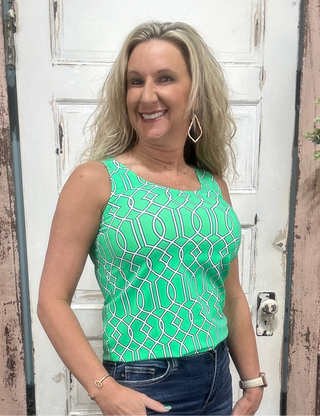 Classic sleeveless tank with a 24" back length. Stretchy, pre-shrunk, and easy to care for—perfect for layering or wearing solo in warm weather.

Features a Green/White/Navy Geometric Pattern