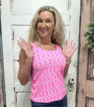 Classic sleeveless tank with a 24" back length. Stretchy, pre-shrunk, and easy to care for—perfect for layering or wearing solo in warm weather.

Features a Green/White/Pink Geometric Pattern