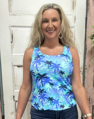 Classic sleeveless tank with a 24" back length. Stretchy, pre-shrunk, and easy to care for—perfect for layering or wearing solo in warm weather.

Features a Blue/Navy/Teal/White Palm Tree Pattern