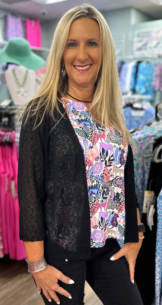 The Lulu-B Textured Cardigan in Black features a beautiful woven pattern with a richly textured fabric that adds subtle dimension and a touch of elevated style to any outfit — that classic black colorway makes it the most versatile layer in your wardrobe, whether you're throwing it over a sundress, a tank and shorts, or your favorite printed set.