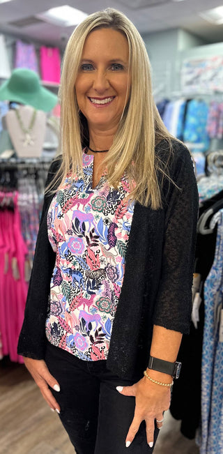 The Lulu-B Textured Cardigan in Black features a beautiful woven pattern with a richly textured fabric that adds subtle dimension and a touch of elevated style to any outfit — that classic black colorway makes it the most versatile layer in your wardrobe, whether you're throwing it over a sundress, a tank and shorts, or your favorite printed set.