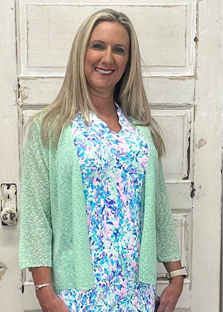 The Lulu-B Textured Cardigan in Lime features a beautiful woven pattern with a richly textured fabric that adds a bold pop of color and subtle dimension to any outfit — super lightweight construction provides breezy arm coverage without adding warmth, making it the perfect layer for warm-weather days when you want to stand out without overheating.