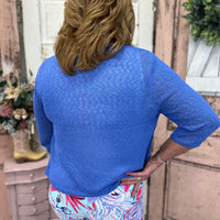 Stay stylish with this lightweight cardigan featuring a textured weave pattern. Perfect for summer, it offers great arm coverage without feeling too hot.