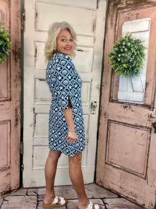 Lulu-B travel dress with SPF 50 sun protection, lightweight nylon spandex fabric, v-neckline, quarter sleeves, side slits, breathable and comfortable for travel, vacations, and everyday wear.
