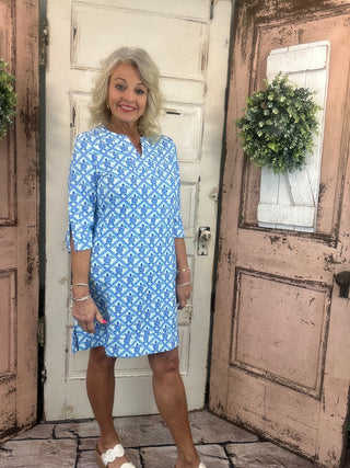 Lulu-B travel dress with SPF 50 sun protection, lightweight nylon spandex fabric, v-neckline, quarter sleeves, side slits, breathable and comfortable for travel, vacations, and everyday wear.