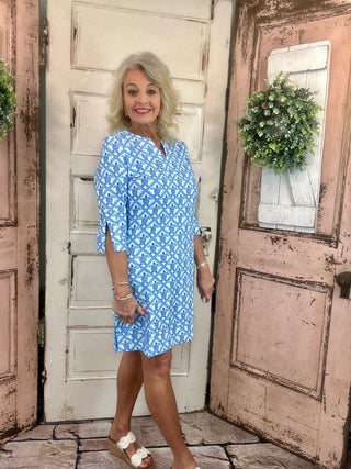 Lulu-B travel dress with SPF 50 sun protection, lightweight nylon spandex fabric, v-neckline, quarter sleeves, side slits, breathable and comfortable for travel, vacations, and everyday wear.
