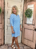 Lulu-B travel dress with SPF 50 sun protection, lightweight nylon spandex fabric, v-neckline, quarter sleeves, side slits, breathable and comfortable for travel, vacations, and everyday wear.
