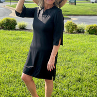 Introducing the Lulu-B Travel Dress! This dress is perfect for all your adventures with its SPF 50 fabric and quarter sleeves for sun protection. Pair it with the v-neck and side slits for a stylish and comfortable outfit. Get ready to travel in style and safety!
