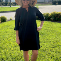 Introducing the Lulu-B Travel Dress! This dress is perfect for all your adventures with its SPF 50 fabric and quarter sleeves for sun protection. Pair it with the v-neck and side slits for a stylish and comfortable outfit. Get ready to travel in style and safety!