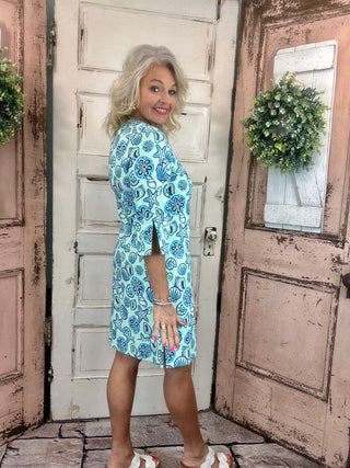 Lulu-B travel dress with SPF 50 sun protection, lightweight nylon spandex fabric, v-neckline, quarter sleeves, side slits, breathable and comfortable for travel, vacations, and everyday wear.