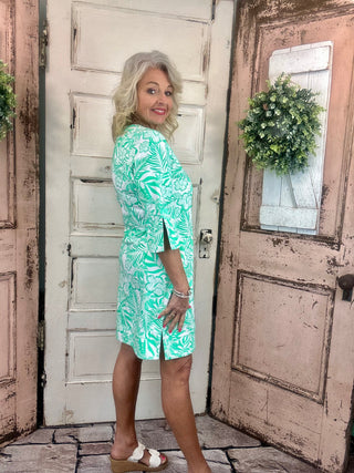 Lulu-B travel dress with SPF 50 sun protection, lightweight nylon spandex fabric, v-neckline, quarter sleeves, side slits, breathable and comfortable for travel, vacations, and everyday wear.