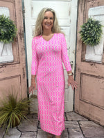maxi dress features flattering elbow-length sleeves, a straight hemline, and UPF50+ sun protection
Pink/Green/White Geometric Pattern Maxi Dress 
