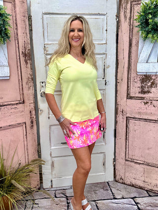Lulu-B V-Neck 3/4 Sleeve Top in yellow with UPF 50 protection, stretchy pre-shrunk fabric, and a flattering fit for all-day comfort.