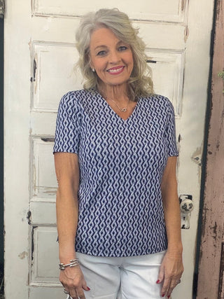 Stay effortlessly cool and stylish in our V-Neck Short Sleeve Top! Designed for comfort and performance, this lightweight top is made from sun-protective fabric, keeping you safe while you enjoy the outdoors. The flattering V-neckline adds a chic touch, making it perfect for everything from casual outings to active adventures. Whether you're soaking up the sun or on the go, this top ensures all-day comfort and protection in style!