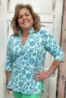 Jet set in ultimate style in the Women's V-Neck Travel Tunic Top from Lulu-B! This beautifully sleek shirt is made from a wonderfully smoothing nylon blend that will skim your curves just right, plus the fabric has UPF 50+ sun protection to keep your mind at ease on even the hottest days. A stunning v-neckline doesn't compromise on cuteness when your priority is comfort, so you'll be looking and feeling great in this tunic-length top. The vibrant colors and patterns of this adorable quarter-sleeve top add p

