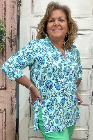 Jet set in ultimate style in the Women's V-Neck Travel Tunic Top from Lulu-B! This beautifully sleek shirt is made from a wonderfully smoothing nylon blend that will skim your curves just right, plus the fabric has UPF 50+ sun protection to keep your mind at ease on even the hottest days. A stunning v-neckline doesn't compromise on cuteness when your priority is comfort, so you'll be looking and feeling great in this tunic-length top. The vibrant colors and patterns of this adorable quarter-sleeve top add p