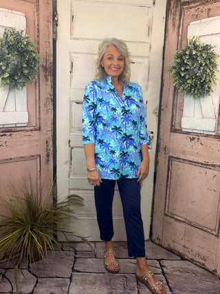 Jet set in ultimate style in the Women's V-Neck Travel Tunic Top from Lulu-B! This beautifully sleek shirt is made from a wonderfully smoothing nylon blend that will skim your curves just right, plus the fabric has UPF 50+ sun protection to keep your mind at ease on even the hottest days. A stunning v-neckline doesn't compromise on cuteness when your priority is comfort, so you'll be looking and feeling great in this tunic-length top. The vibrant colors and patterns of this adorable quarter-sleeve top add p