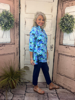 Jet set in ultimate style in the Women's V-Neck Travel Tunic Top from Lulu-B! This beautifully sleek shirt is made from a wonderfully smoothing nylon blend that will skim your curves just right, plus the fabric has UPF 50+ sun protection to keep your mind at ease on even the hottest days. A stunning v-neckline doesn't compromise on cuteness when your priority is comfort, so you'll be looking and feeling great in this tunic-length top. The vibrant colors and patterns of this adorable quarter-sleeve top add p
