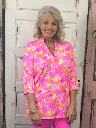 Jet set in ultimate style in the Women's V-Neck Travel Tunic Top from Lulu-B! This beautifully sleek shirt is made from a wonderfully smoothing nylon blend that will skim your curves just right, plus the fabric has UPF 50+ sun protection to keep your mind at ease on even the hottest days. A stunning v-neckline doesn't compromise on cuteness when your priority is comfort, so you'll be looking and feeling great in this tunic-length top. The vibrant colors and patterns of this adorable quarter-sleeve top add p
