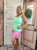 UPF50+ zip skort with pull-on waistband, lightweight A-line fit, sewn-in shorts for coverage, zip side slit, back zip pocket, front pocket, 17-inch skirt length, machine washable performance fabric.
