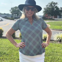 Lulu B V-Neck Collared Top offers UPF 50+, wrinkle-free comfort, and polished style—perfect for travel, sun, and effortless everyday wear.