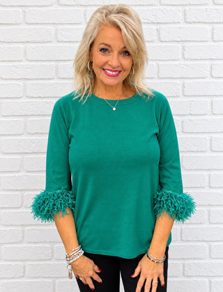 Color | Emerald (EMRL) — a rich, jewel-toned emerald green that makes a statement while staying effortlessly elegant
Neckline | Scoop neck
Sleeve | Elbow-length with fringe detail
Fabric | Luxuriously soft, lightweight cashmere blend
Feel | Cozy and comfortable against the skin
Care | Follow garment care label instructions