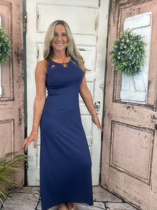 Sexy maxi dress with straight fit, cutout back detail, and UPF50 sun protection fabric for stylish summer wear.