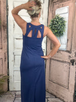Sexy maxi dress with straight fit, cutout back detail, and UPF50 sun protection fabric for stylish summer wear.
