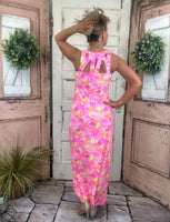 Sexy maxi dress with straight fit, cutout back detail, and UPF50 sun protection fabric for stylish summer wear.
