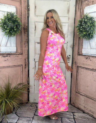 Sexy maxi dress with straight fit, cutout back detail, and UPF50 sun protection fabric for stylish summer wear.