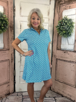 Lulu-B short sleeve 1/4 zip dress with UPF50+ sun protection, lightweight cooling nylon-spandex fabric, stretchy fit, and easy-care machine washable design.
