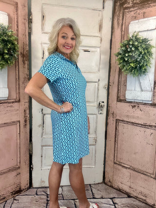 Lulu-B short sleeve 1/4 zip dress with UPF50+ sun protection, lightweight cooling nylon-spandex fabric, stretchy fit, and easy-care machine washable design.