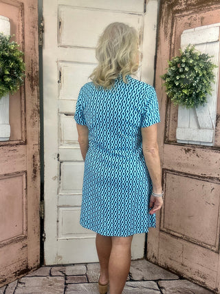 Lulu-B short sleeve 1/4 zip dress with UPF50+ sun protection, lightweight cooling nylon-spandex fabric, stretchy fit, and easy-care machine washable design.
