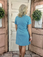 Lulu-B short sleeve 1/4 zip dress with UPF50+ sun protection, lightweight cooling nylon-spandex fabric, stretchy fit, and easy-care machine washable design.
