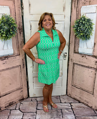 Sleeveless quarter zip swing dress crafted in cooling UPF50 fabric, offering breezy comfort and stylish sun protection for warm-weather wear.