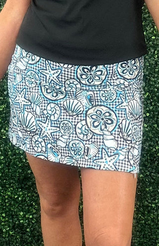 UPF50 zip skort with 2-inch pull-on waistband, A-line fit, sewn-in shorts, side zip slip, zip back pocket, small front pocket, and 17-inch length.