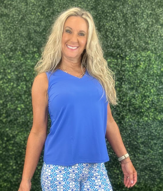 Stay cool, comfortable, and effortlessly stylish in this Lulu-B Sleeveless V-Neck Top. Made with lightweight, breathable SPX fabric, it offers all-day comfort with premium UPF50+ sun protection. The cooling, quick-drying material moves with you, making it perfect for everyday wear, travel, outdoor activities, or layering.