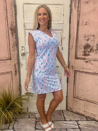 Mackenzie Dress Pastel Reef

Cap sleeve V-neck dress

UPF50+ summer dress

Nylon spandex lightweight dress

Breezy casual dress

Quick-dry summer dress

Wrinkle-free pastel dress

Vacation or beach dress

Casual weekend outfit

Pastel reef cap sleeve dress