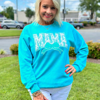 💙✨ The Cutest MAMA Sweatshirt You’ll Ever Own! ✨💙
Wrap yourself in cozy style with our Scuba Blue MAMA Crew Sweatshirt! The bold floral patch letters pop against the vibrant blue, while a sparkling sequin bow adds that perfect touch of glam. Whether you’re running errands, relaxing at home, or grabbing coffee with friends, this sweatshirt is a must-have for every proud mama.