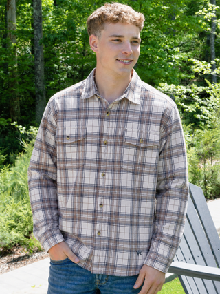 Pattern | Light brown plaid
Neckline | Classic collar, button-front
Pockets | Two chest pockets with button closures
Detail | Signature Western yokes
Fit | Tailored
Fabric | 98% Polyester, 2% Spandex — soft, flexible, and easy to care for
Brand | Simply Southern