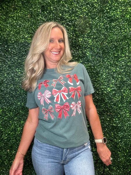 Merry & Bowed Tee
women’s holiday t-shirt
Christmas bow graphic tee
blue spruce Comfort Colors shirt
festive holiday tee
Christmas short sleeve shirt for women
casual holiday gathering tee
soft festive graphic t-shirt
true to size Christmas top
layering tee for holiday outfits
gift for her holiday t-shirt