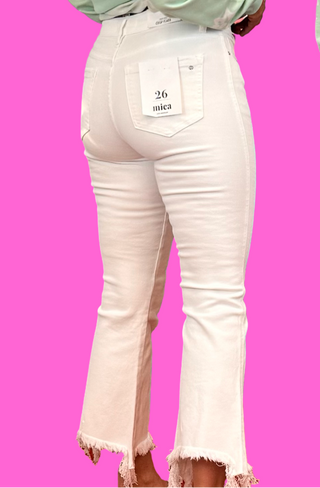 Brand | Mica Denim
Colorway | White
Rise | High-rise
Silhouette | Crop flare with uneven hem detail
Fabric | 98% cotton, 2% spandex — soft, structured, and comfortable
Fit | Fitted through the hip and thigh, flared from the knee with a cropped, uneven hem finish
Front Rise | 10"
Inseam | 27"
Leg Opening | 19"
