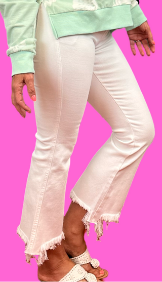 Brand | Mica Denim
Colorway | White
Rise | High-rise
Silhouette | Crop flare with uneven hem detail
Fabric | 98% cotton, 2% spandex — soft, structured, and comfortable
Fit | Fitted through the hip and thigh, flared from the knee with a cropped, uneven hem finish
Front Rise | 10"
Inseam | 27"
Leg Opening | 19"
