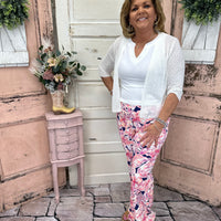 Stay chic and sun-safe in our Molly Wide Leg Pants in Tropical Haven print. With UPF50 fabric, side pockets, and a comfy stretch waistband, they’re perfect for summer.
